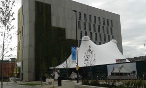 The Core and its green wall, and the white roof of the Key - first university building on site. Photo: AnnVixen