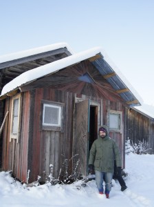 Markus shows us the outhouse of Flurlundar farm, built of wastewood. Photo: Agata Mazgaj